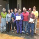 Ms. Siplin stated that it was difficult to narrow the top volunteer honor to one person. Mrs. Elouise Kelly And Mrs. Kelly and Mr. William “Bill” Harleaux were honored as top volunteers. Mrs. Kelly’s family at left surprised her.